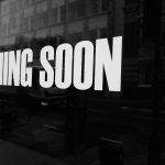 image of white lettering on black background with text of "Coming Soon"